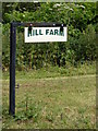 TM3586 : Hill Farm sign by Geographer