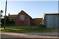 House and buildings marked "The Grange" at Calceby