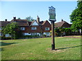 The village sign on the green at Brasted