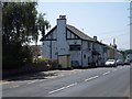 Bus shelter and the Anchor Inn, Chudleigh Knighton