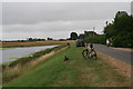 Holiday-makers and fishermen outside Holly Farm Country Park