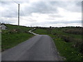 View southwards along the elegantly meandering School Road, Lisnisk TD