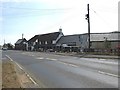 The road through Whiddon Down, looking towards the Post Inn