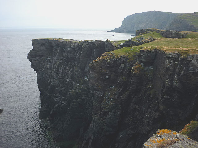Overhanging sea cliffs at An Fharaid