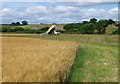 Lorry delivering aggregate for land drainage