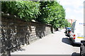 Wall and parked vehicles on Clarendon Road