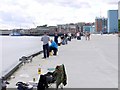 NZ3668 : Fishing on Western Quay, North Shields by Andrew Curtis