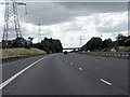 SP4591 : Power lines cross the M69 by Peter Whatley