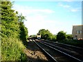 Train approaching Glebe Road level crossing