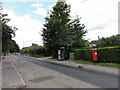 High Street during road renewal, with telephone box and post box