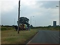 Junction with a horse drawn caravan near Kemberton