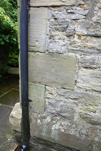 Benchmark behind downpipe on #9 Railway Cottages