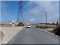 Electricity transmission lines cross road near Lydd