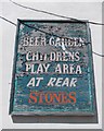 Flaking sign on the front of "The Donfield Tavern"