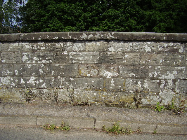 Ordnance Survey bench-mark on former railway bridge