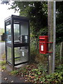 Padog: postbox № LL24 66 and phone