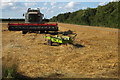 TL0341 : Arable field with harvester by Philip Jeffrey