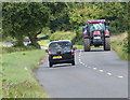 SP3597 : Tractor and car along Fenn Lanes by Mat Fascione