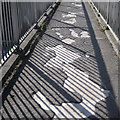 Worn tarmac, footbridge over Alvechurch Highway, Redditch