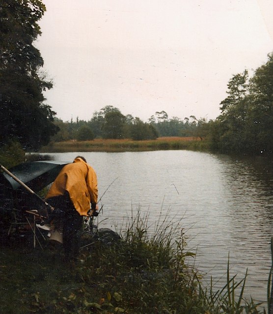 Fishing in the rain at Scoulton Mere