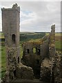 NU2521 : The western tower of the ruined gatehouse, Dunstanburgh Castle by Graham Robson