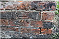 Benchmark on Scruton Station building