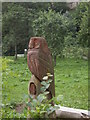 NY9393 : Tree-stump sculpture in Elsdon by Stanley Howe