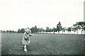 Child with dandelion clock, Racecourse 1955