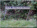 TM1284 : Back Heywood Road sign by Geographer