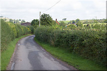 SP1061 : Lane approaches Upper Spernall Farm by David P Howard