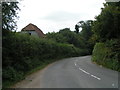 The B3165 heading south past Home Farm