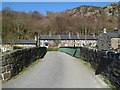 Across a bridge over the Afon Glaslyn in Beddgelert