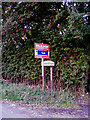 TM1283 : Lodge Farm sign by Geographer