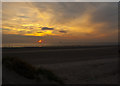 SJ3198 : Sunset from Crosby beach by Ian Greig