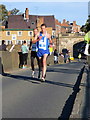 SJ4065 : MBNA Chester Marathon 2013 - The leaders on the Old Dee Bridge by John S Turner