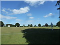 Cricket match in progress at the rec