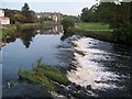 The weir on the River Bush above the Millennium Footbridge