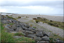 NJ3465 : Beach and sea defences at Tugnet by jeff collins