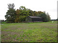 Barn in the shelter of Black Clump