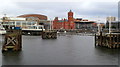 Watery view towards the Pierhead Building, Cardiff Bay