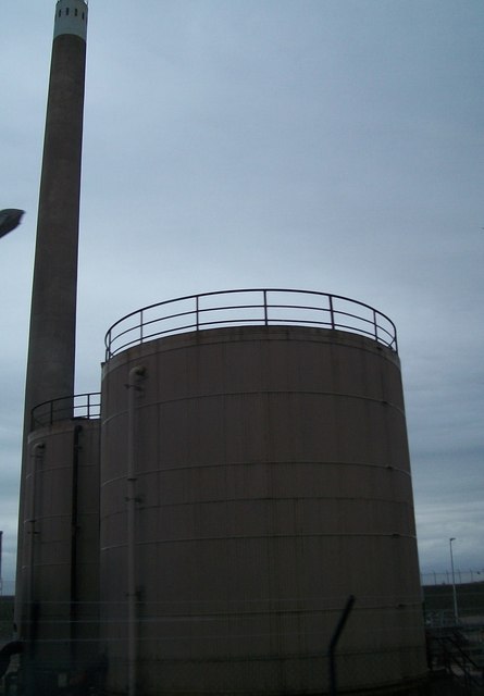 Storage tanks and chimney at the Cloghan... © Eric Jones cc-by-sa/2.0 ...