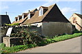 Farm building converted to housing at Sandylane Farm