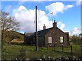 Boarded-up cottage at Fingland