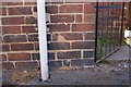 Benchmark on #37 Blackpool Street (Bailey Street face)