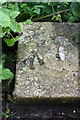 Benchmark on bridge over Northfield Brook