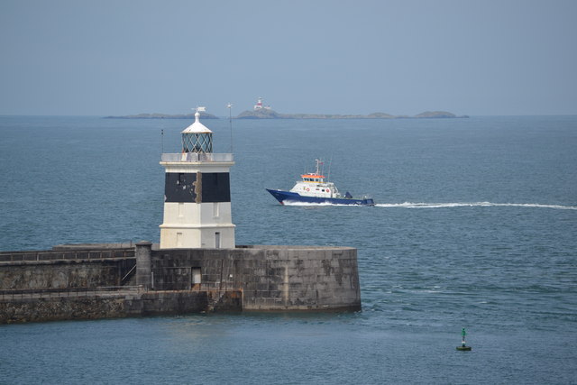 Breakwater Lighthouse and Smit Towy, viewed from P&O's Adonia docked at the Anglesey Aluminium Jetty, Holyhead