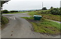 Grit bin on a grass triangle near Llanddewi Ystradenni