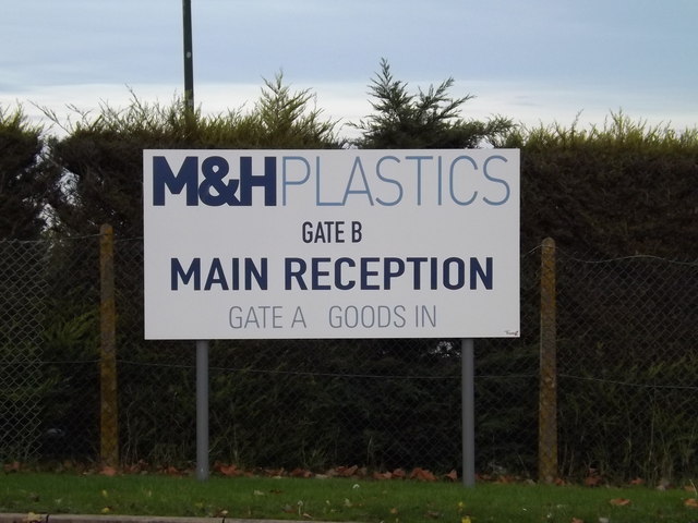 M & H Plastics sign