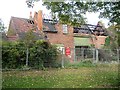 Burnt-out former farm buildings, Pype Hayes Park