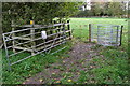 Gates on the footpath to the spinney